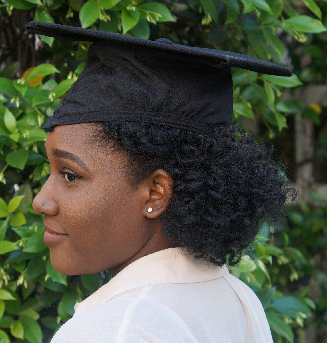 Short Coily Hair with Side Part Short Coily Hair with Side Part — Graduation Hairstyles with Cap