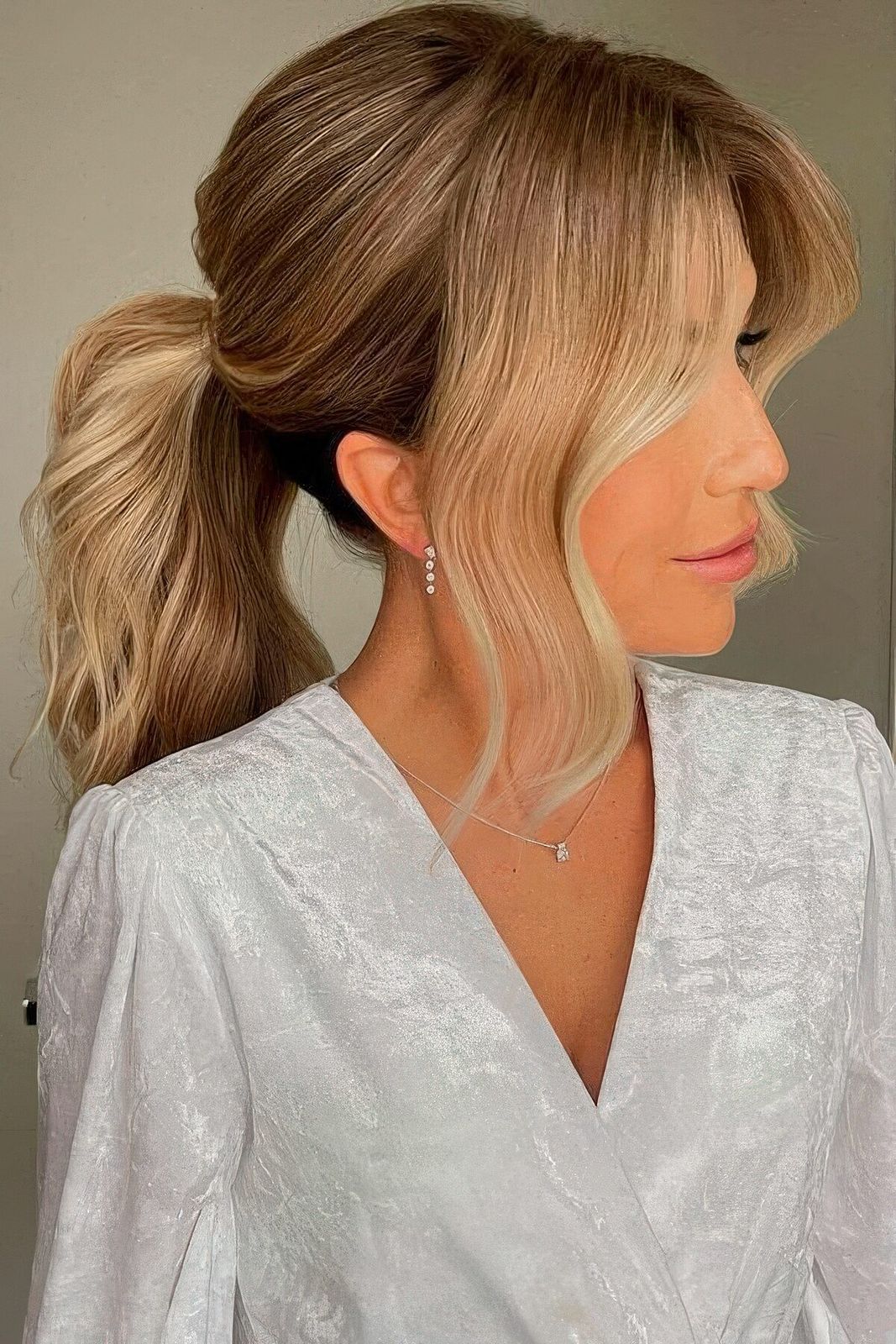 Voluminous Honey Blonde Ponytail with Curtain Bangs — Ponytail with Bangs