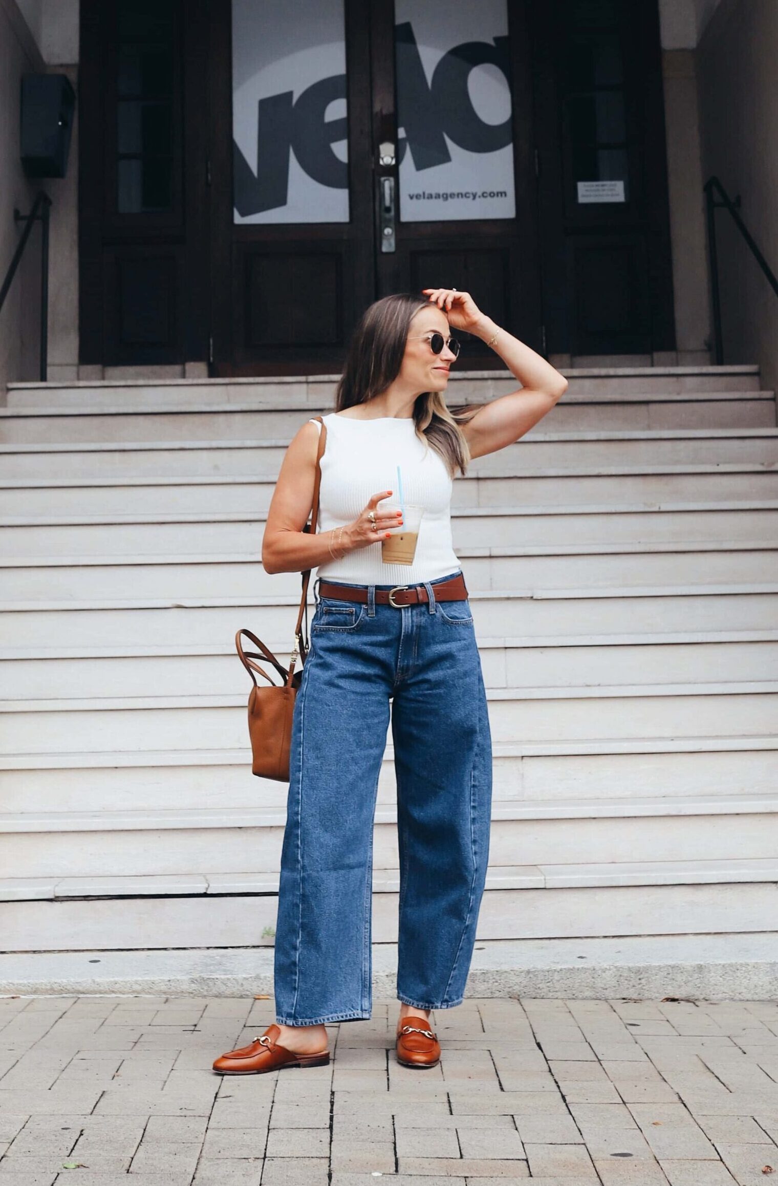 Medium Wash Barrel Jeans with Sleeveless Top and Leather Accessories Medium Wash Barrel Jeans with Sleeveless Top and Leather Accessories — Barrel Jeans Outfits
