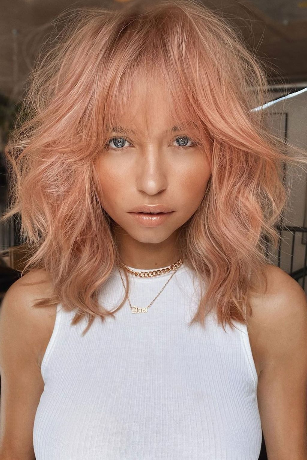 Pastel Rose Gold Shag With Bangs Pastel Rose Gold Shag With Bangs — Rose Gold Hair