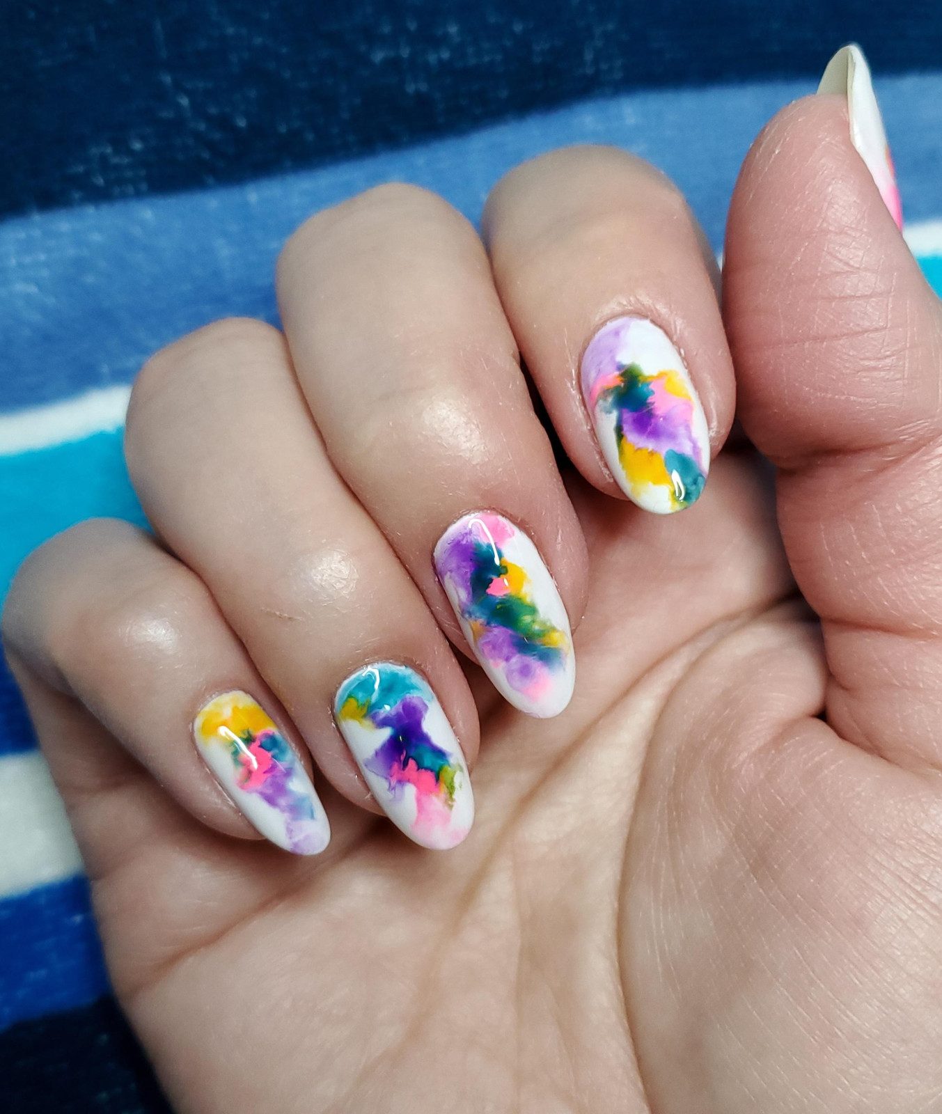 Watercolor for the win! I do my own manicures and find it is a great way to relax AND be creative! Gel overlay on natural nails and blooming gel for the watercolor