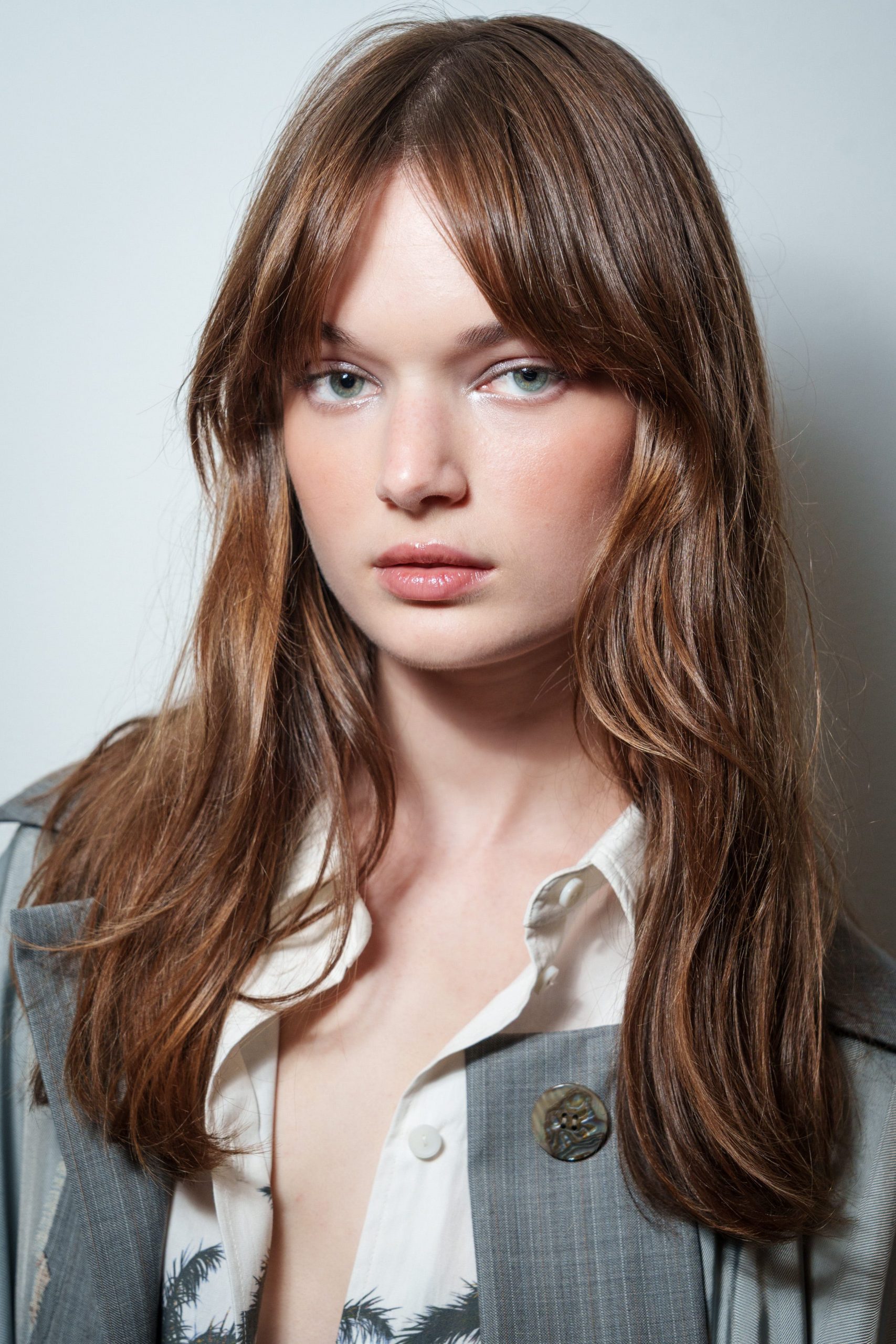 Air-Dried Layers With Full Fringe — Volumizing Haircuts for Thin Hair