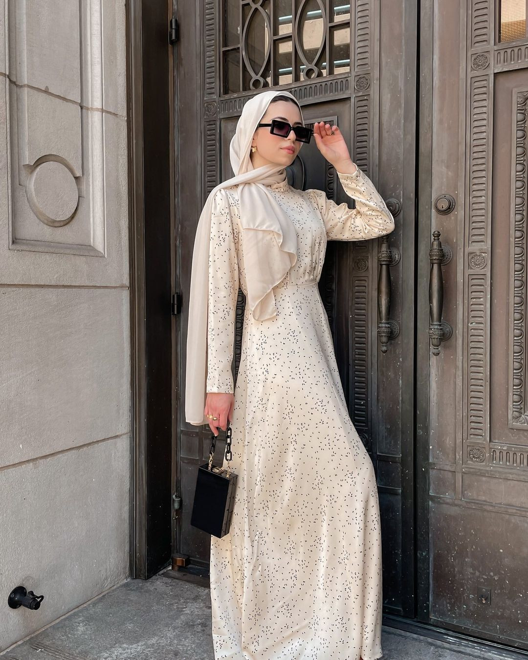 White Tiered Pleated Dress with Black Hijab and Loafers White Tiered Pleated Dress with Black Hijab and Loafers — Hijab Wedding Guest Outfits