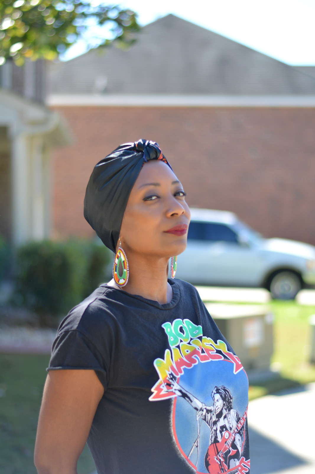 Sleek Black Satin Turban With Graphic Tee Sleek Black Satin Turban With Graphic Tee — Turban Styles