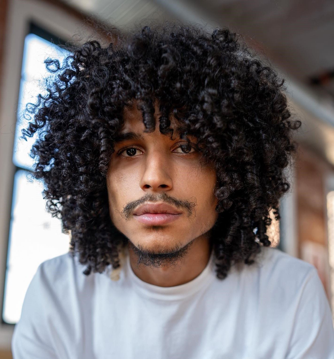 Voluminous Black Curls — Long Hairstyles for Men