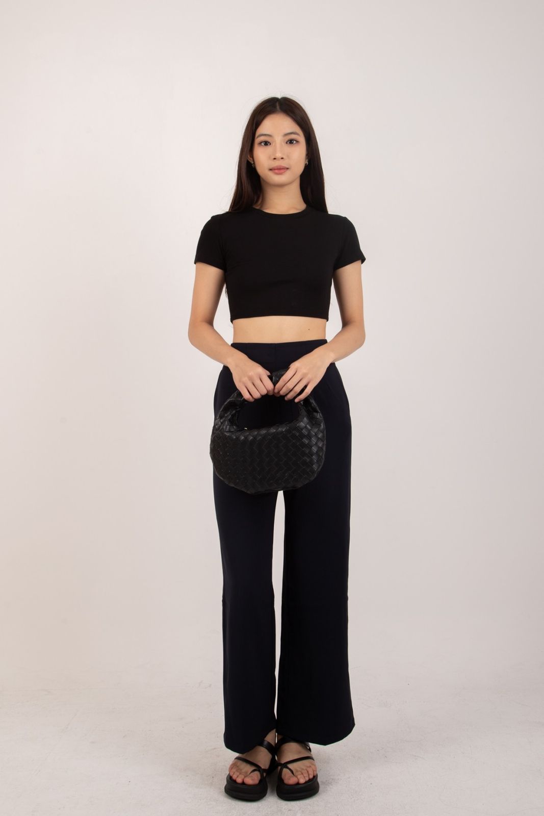 Black Baby Tee with Navy Wide-Leg Pants and Woven Bag Black Baby Tee with Navy Wide-Leg Pants and Woven Bag — Baby Tee Outfits