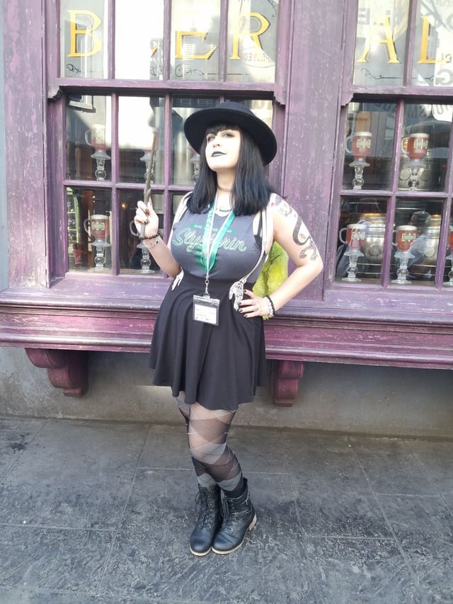 Gothic Charm with Striped Socks and a Wide-Brimmed Hat Gothic Charm with Striped Socks and a Wide-Brimmed Hat — Universal Studios Outfits