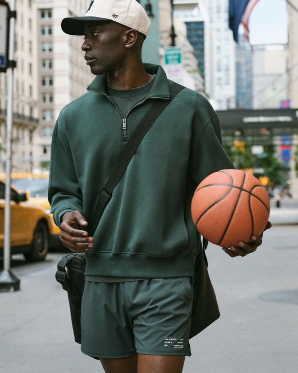 Athleisure Ready: Dark Green Quarter-Zip, Grey Tee, and Shorts — Mens Gym Outfits