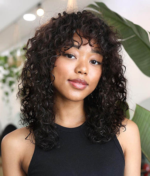 Collarbone Shag Bob With Curly Curtain Bangs Collarbone Shag Bob With Curly Curtain Bangs — Hairstyles with Bangs