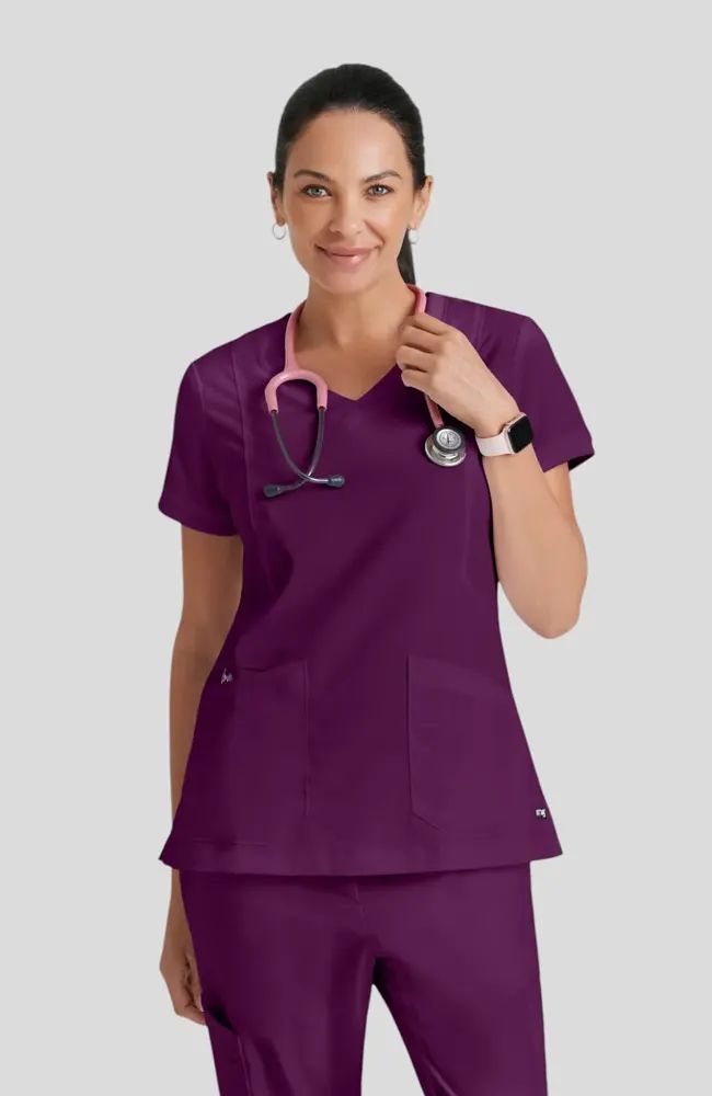Vibrant Purple Scrub Set with Stethoscope Vibrant Purple Scrub Set with Stethoscope — Scrubs Outfits