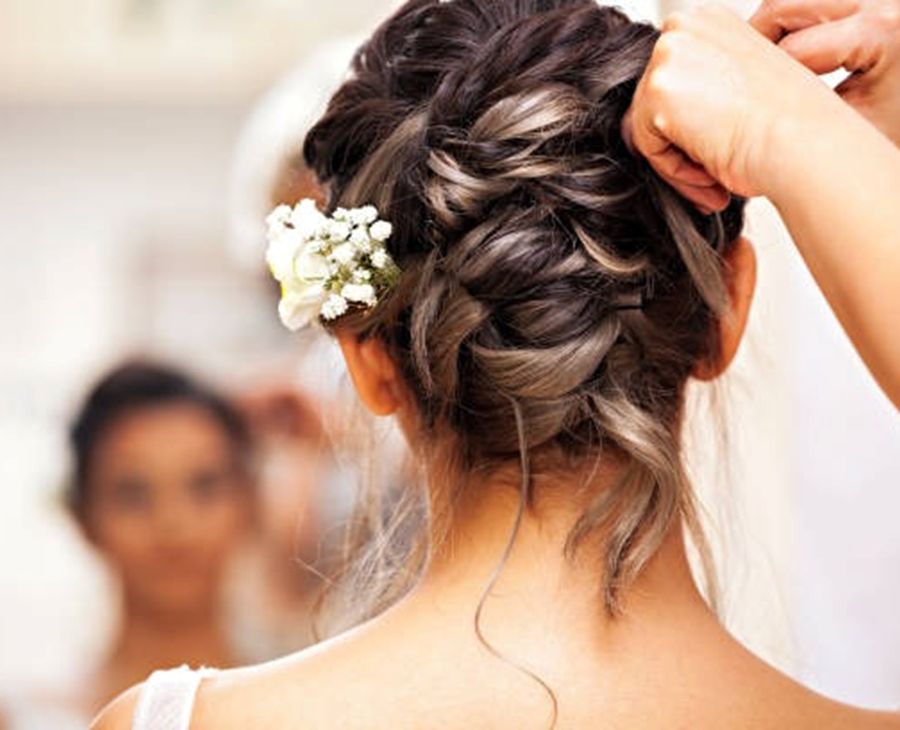 Dark Brown Updo with Flower Accent — Sweet 16 Hairstyles