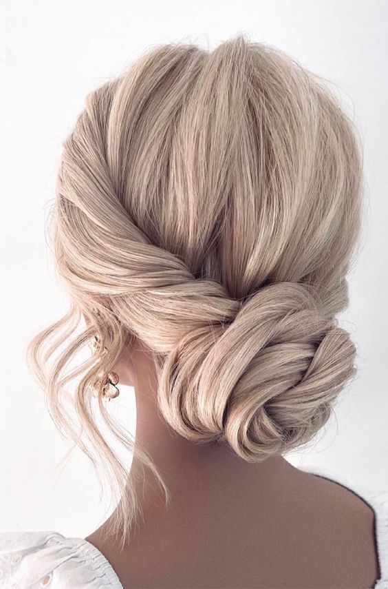Low Twisted Bun With Ash Blonde Highlights Low Twisted Bun With Ash Blonde Highlights — Interview Hairstyles
