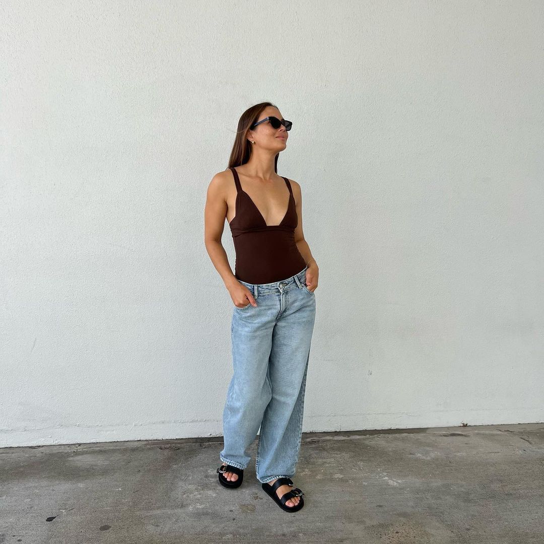 Deep V-Neck Bodysuit with Light Blue Low-Rise Jeans Deep V-Neck Bodysuit with Light Blue Low-Rise Jeans — Low Rise Jeans