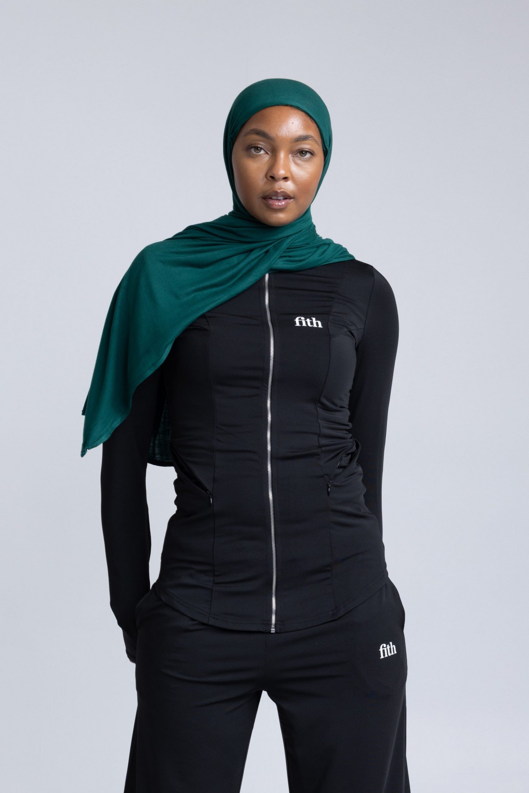 Athleisure-Inspired: Dark Green Hijab with Black Layers — Hijab Work Outfits