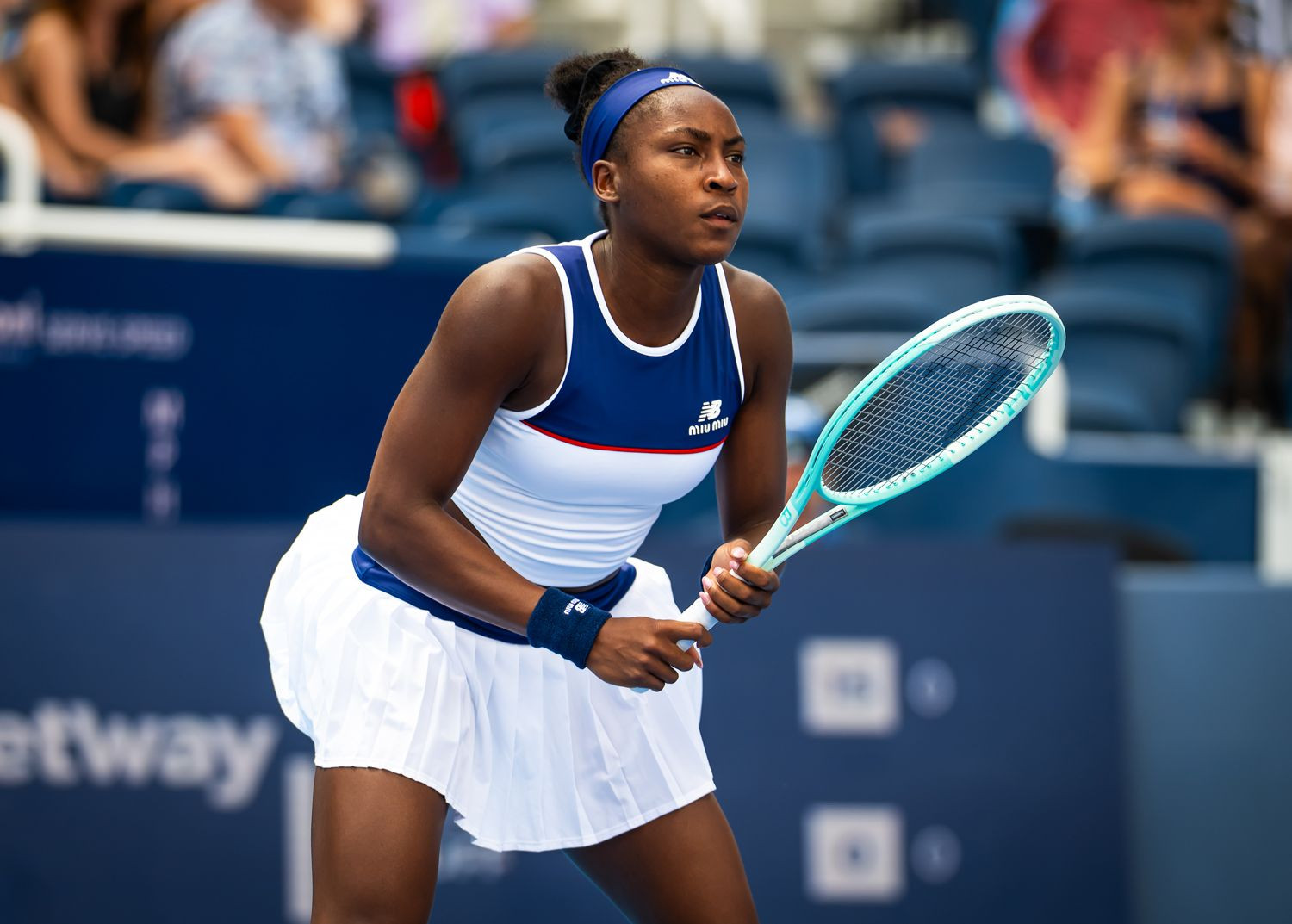 Short Coily Bun with Headband Short Coily Bun with Headband — Tennis Hairstyles