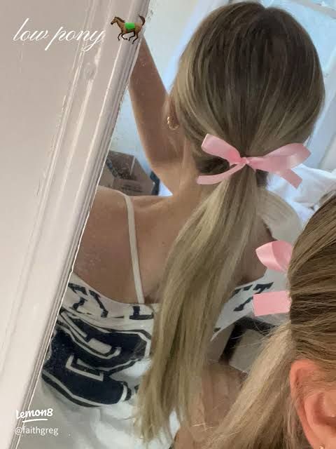 Mid-Back Blonde Wavy Ponytail With Pink Ribbon — Low Ponytail with Bow