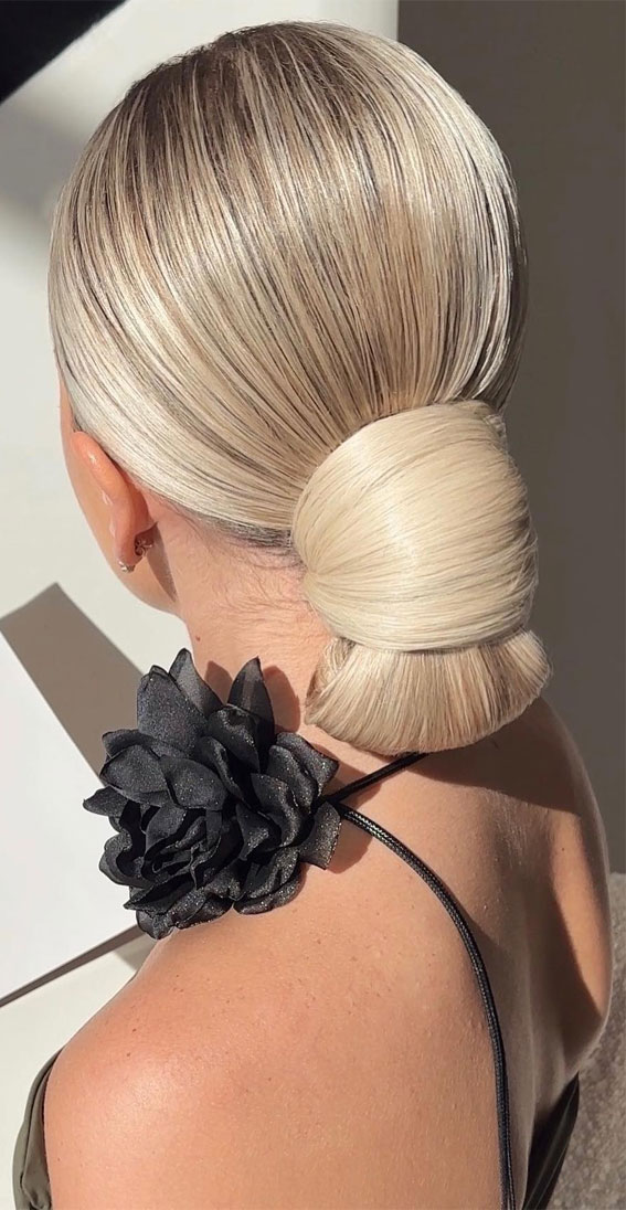 Sleek Platinum Blonde Low Bun — Updos for Medium Hair
