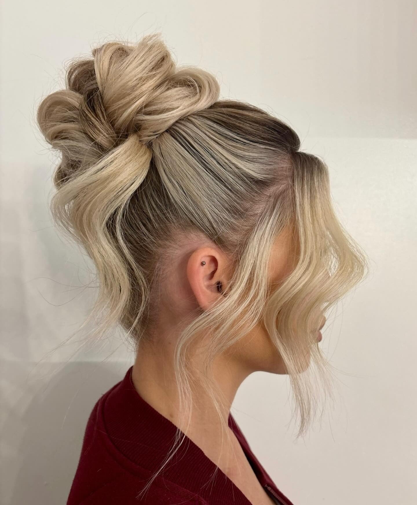 High Bun With Braided Sections High Bun With Braided Sections — Bun Hairstyles