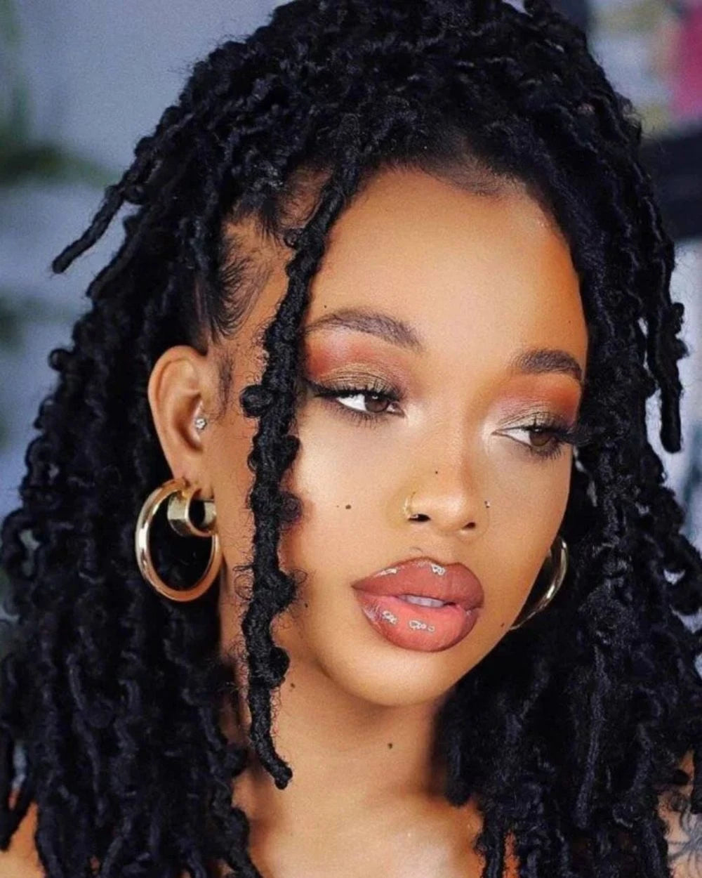 Shoulder-Length Black Butterfly Locs