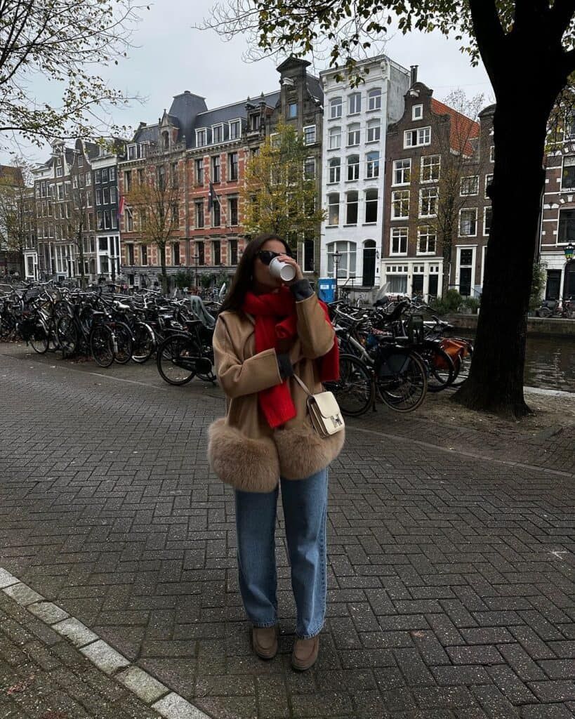 Fur-Trimmed Jacket with Jeans and Red Scarf Fur-Trimmed Jacket with Jeans and Red Scarf — Amsterdam Outfits
