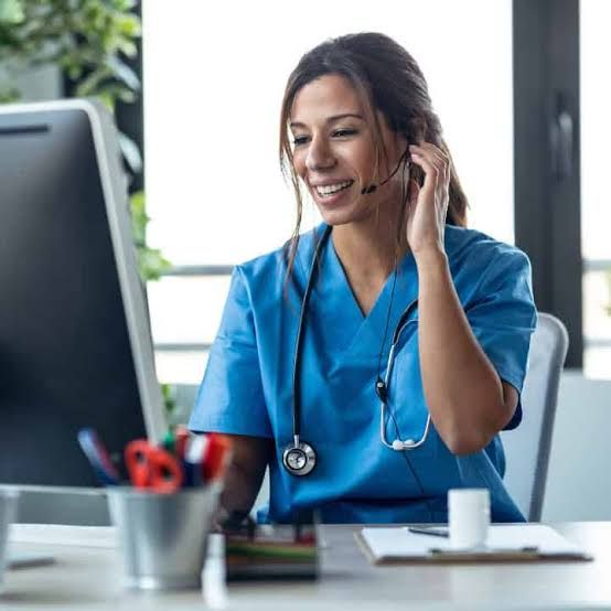Loose-Fit Blue Scrub Top with Headset and Stethoscope Loose-Fit Blue Scrub Top with Headset and Stethoscope — Nurse Outfits