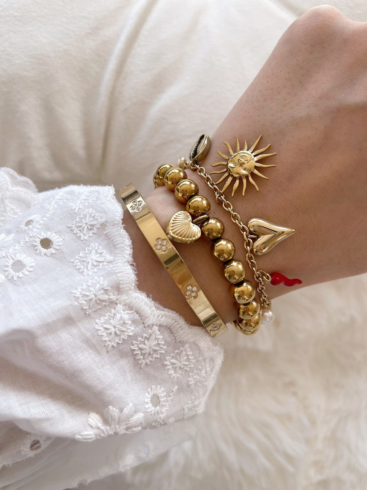 Mixed Metal Bracelets with Sun and Shell Charms Mixed Metal Bracelets with Sun and Shell Charms — Charm Bracelets