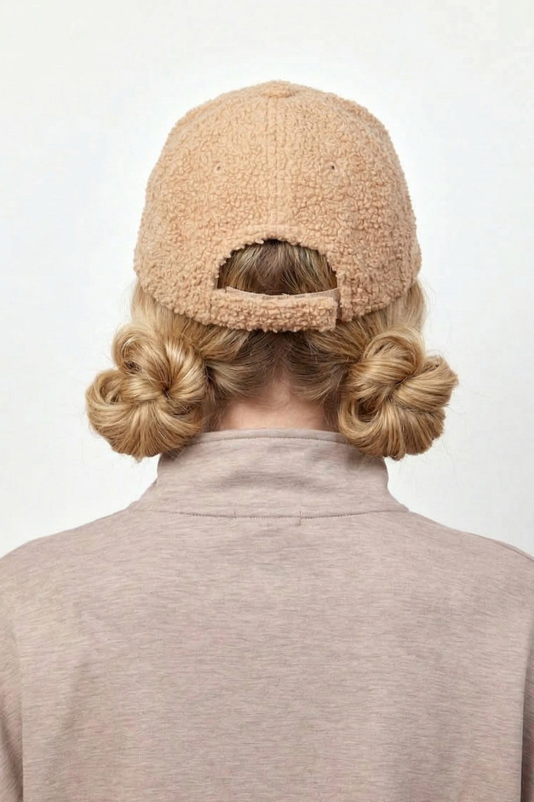 Double Buns with Blonde Highlights Double Buns with Blonde Highlights — Baseball Cap Hairstyles