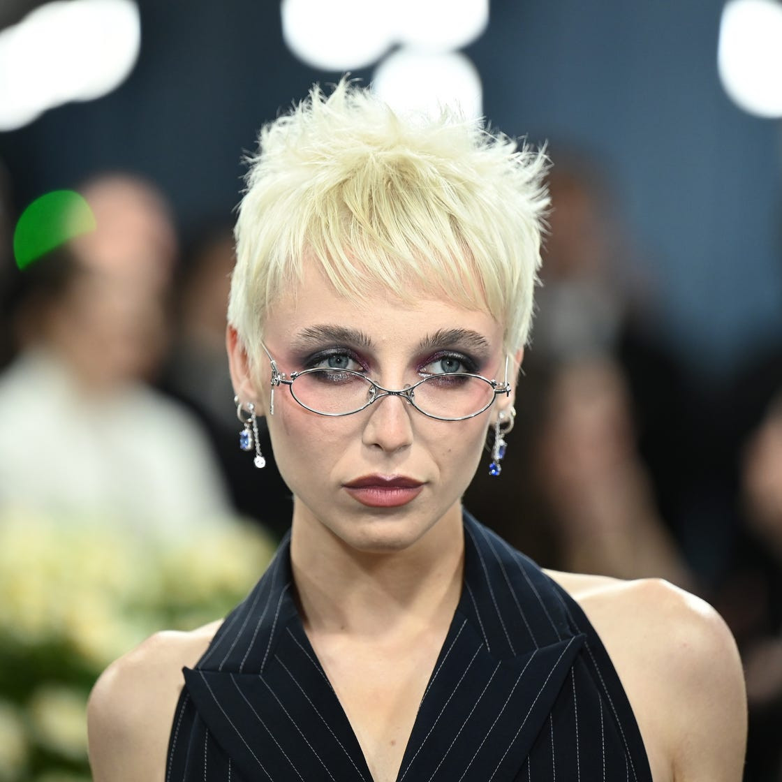 Spiky Platinum Blonde Pixie With Choppy Bangs Spiky Platinum Blonde Pixie With Choppy Bangs — Pixie with Glasses