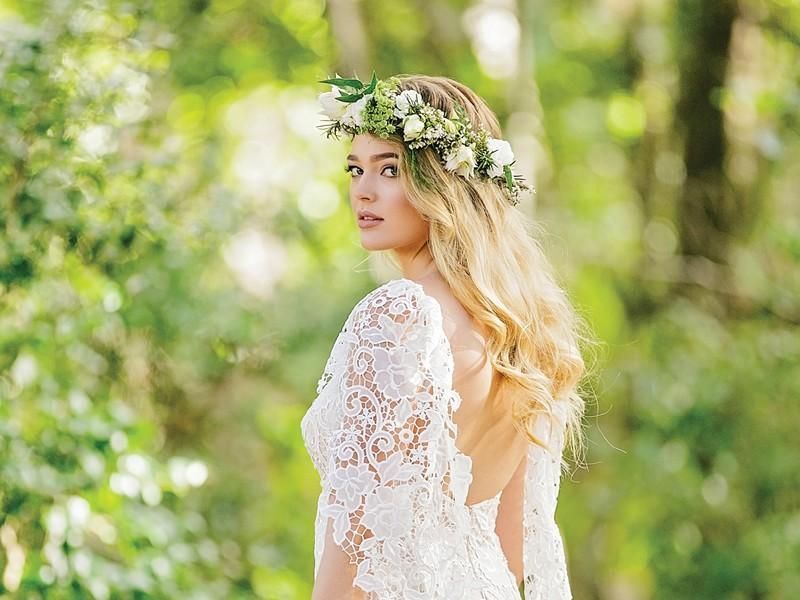 Intricate Braided Updo with Floral Details — Wedding Hairstyles with Flowers