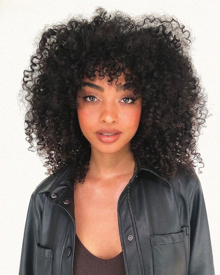 Voluminous Black Coily Hair With Curly Bangs — Natural Hair with Bangs