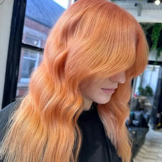 Vibrant Peach Collarbone With Curtain Bangs Vibrant Peach Collarbone With Curtain Bangs — Peach Hair