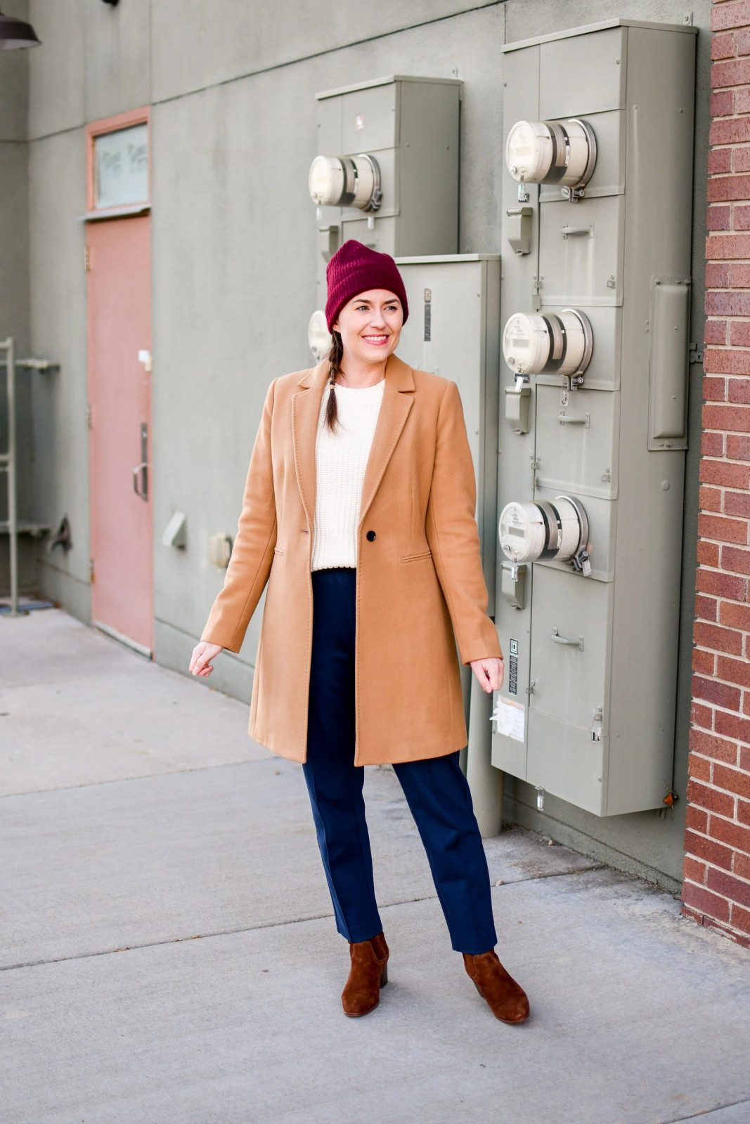 Camel Coat over Cream Sweater and Navy Trousers — First Day of Work Outfits