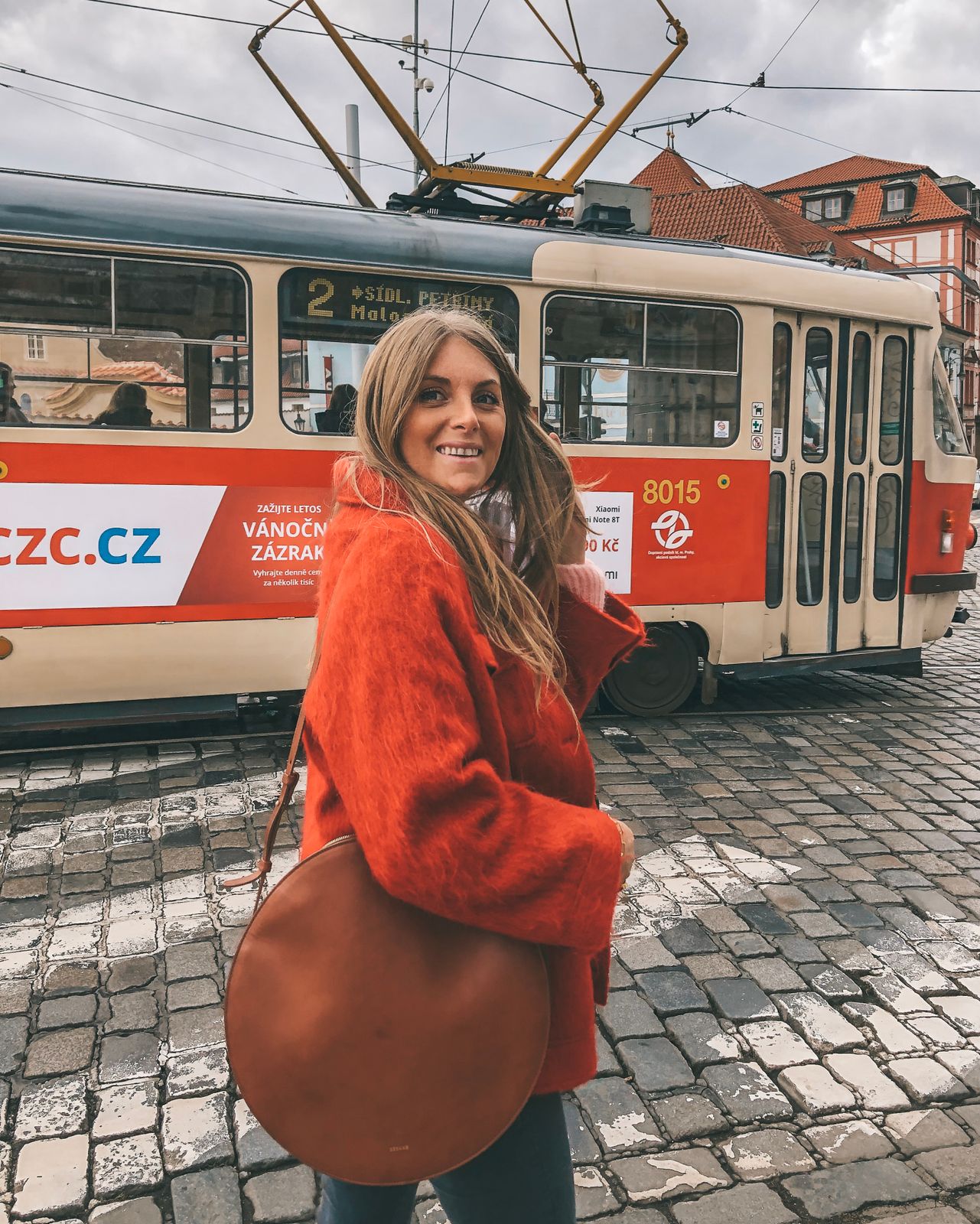 Vibrant Orange Textured Coat with Round Crossbody Bag — Prague Outfits