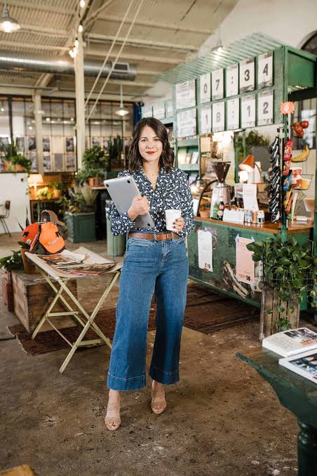 Cropped Indigo Wide Leg Jeans with a Patterned Shirt and Brown Belt