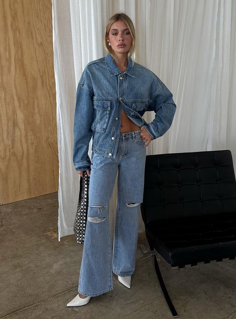 Ripped Low-Rise Jeans with an Oversized Denim Jacket Ripped Low-Rise Jeans with an Oversized Denim Jacket — Low Rise Jeans