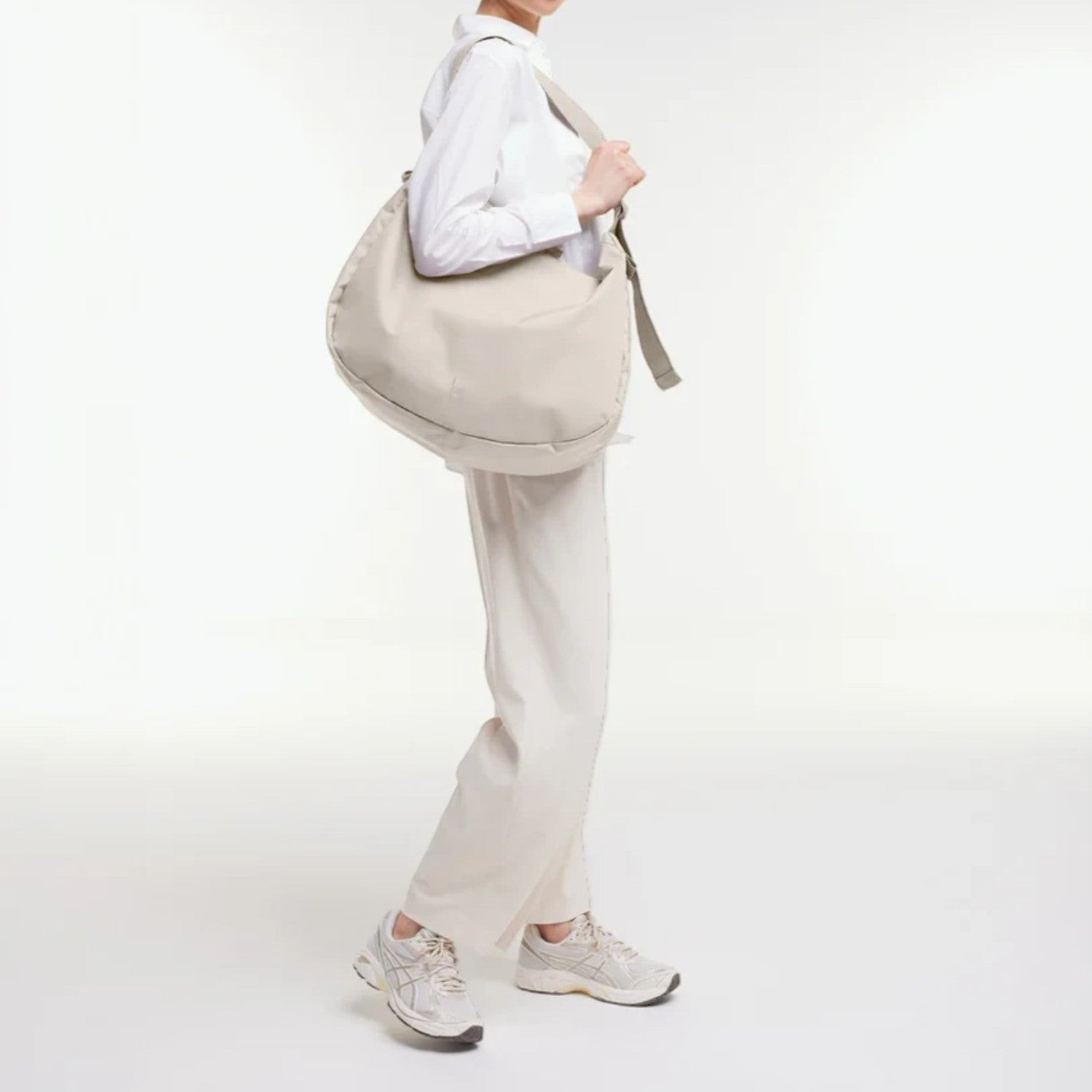 Beige Nylon Hobo Bag with White Shirt and Wide-Leg Trousers — Hobo Bag Outfits