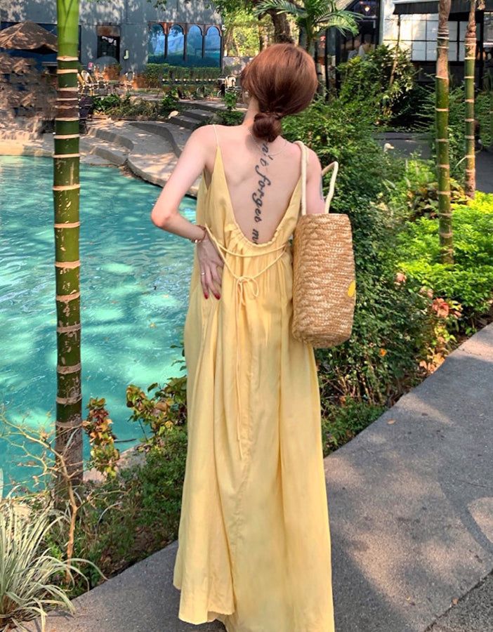Pale Yellow Sleeveless Maxi Dress with Low Back Pale Yellow Sleeveless Maxi Dress with Low Back — Casual Dresses