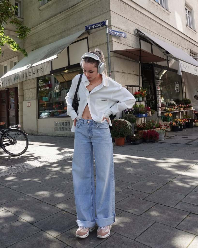 Unbuttoned Shirt Over Bralette with Light Blue Baggy Jeans — Baggy Jeans Outfits