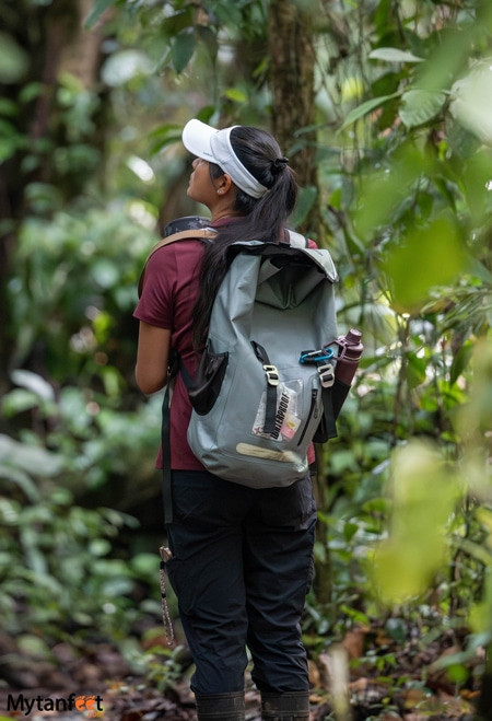 Trail Ready: Maroon Tee, Black Pants, and a Large Grey Backpack — Backpack Outfits Women
