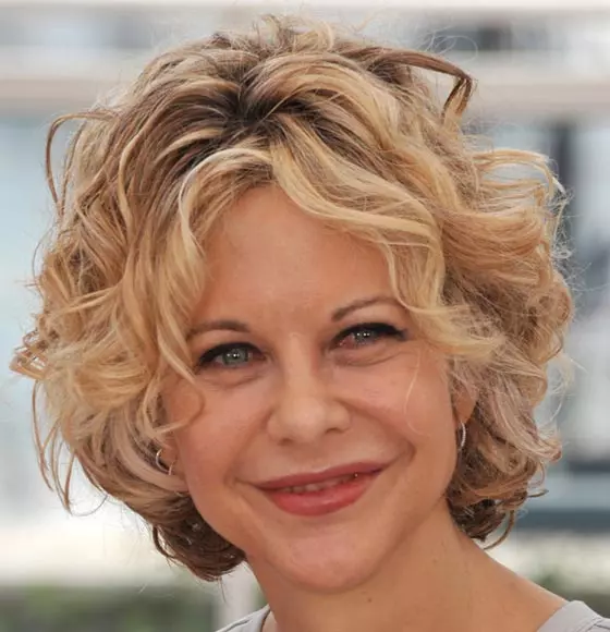 Voluminous Curly Bob With Wispy Bangs Voluminous Curly Bob With Wispy Bangs — Hairstyles for Women Over 40