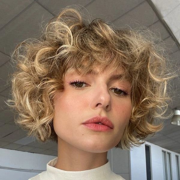 Front View Honey Blonde Bob With Textured Full Bangs — Curly Bob