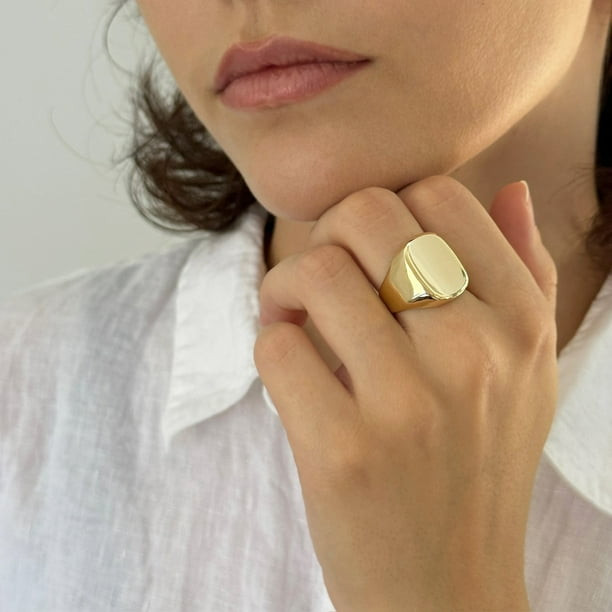 Polished Gold Signet Ring on a Hand with White Collared Shirt Polished Gold Signet Ring on a Hand with White Collared Shirt — Signet Rings
