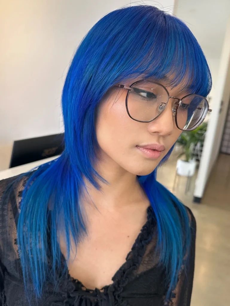 Electric Blue Shag With Curtain Bangs Electric Blue Shag With Curtain Bangs — Electric Blue Hair