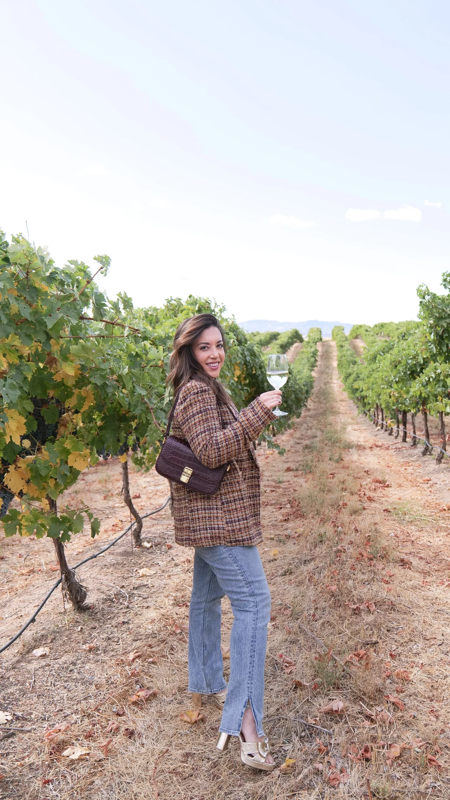 Tweed Blazer and Split-Hem Jeans for a Vineyard Aesthetic — Winery Outfits