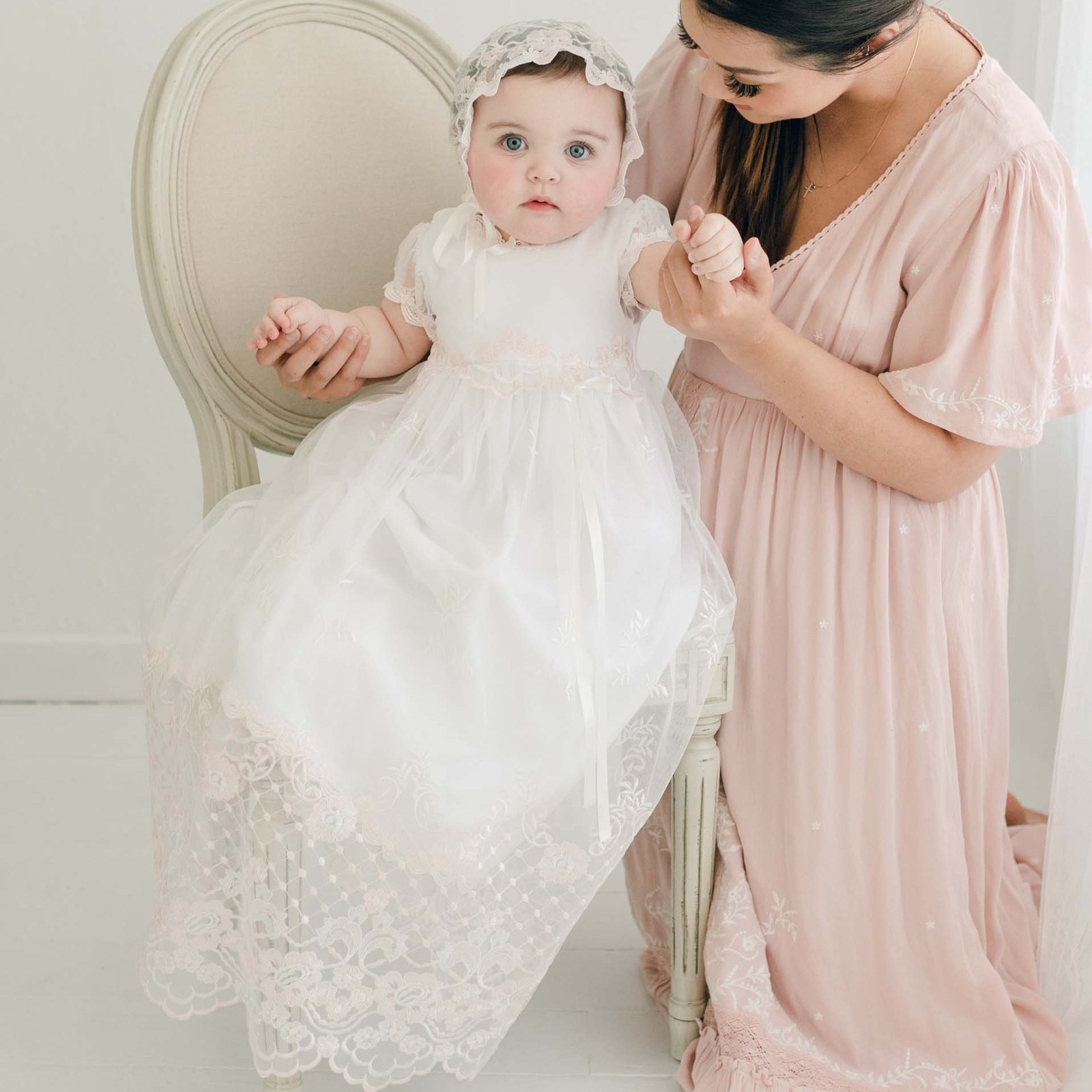 White Christening Gown with Lace Overlay and Pink Trim — Baptism Outfits