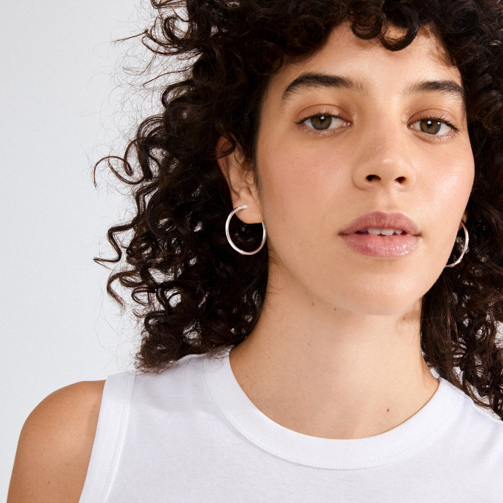 Effortless Cool: Simple Silver Hoops with a White Tank — Silver Hoops Outfits