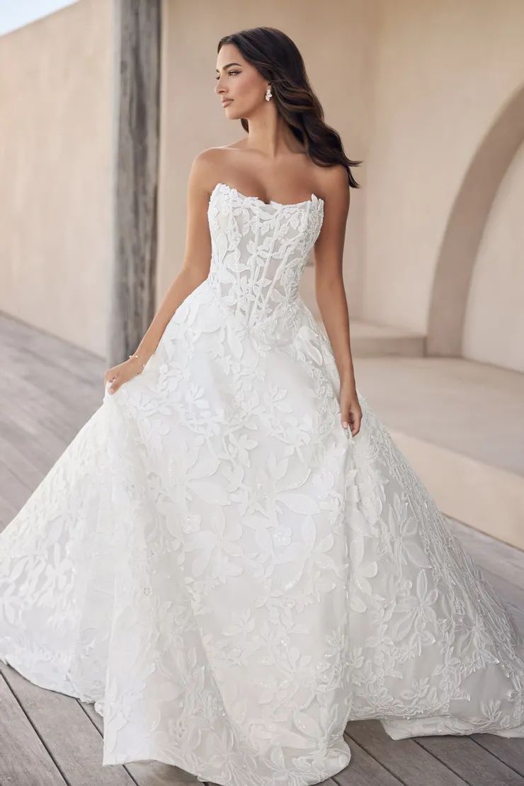 White Strapless Ball Gown with Lace Overlay and Sequins White Strapless Ball Gown with Lace Overlay and Sequins — Ball Gowns