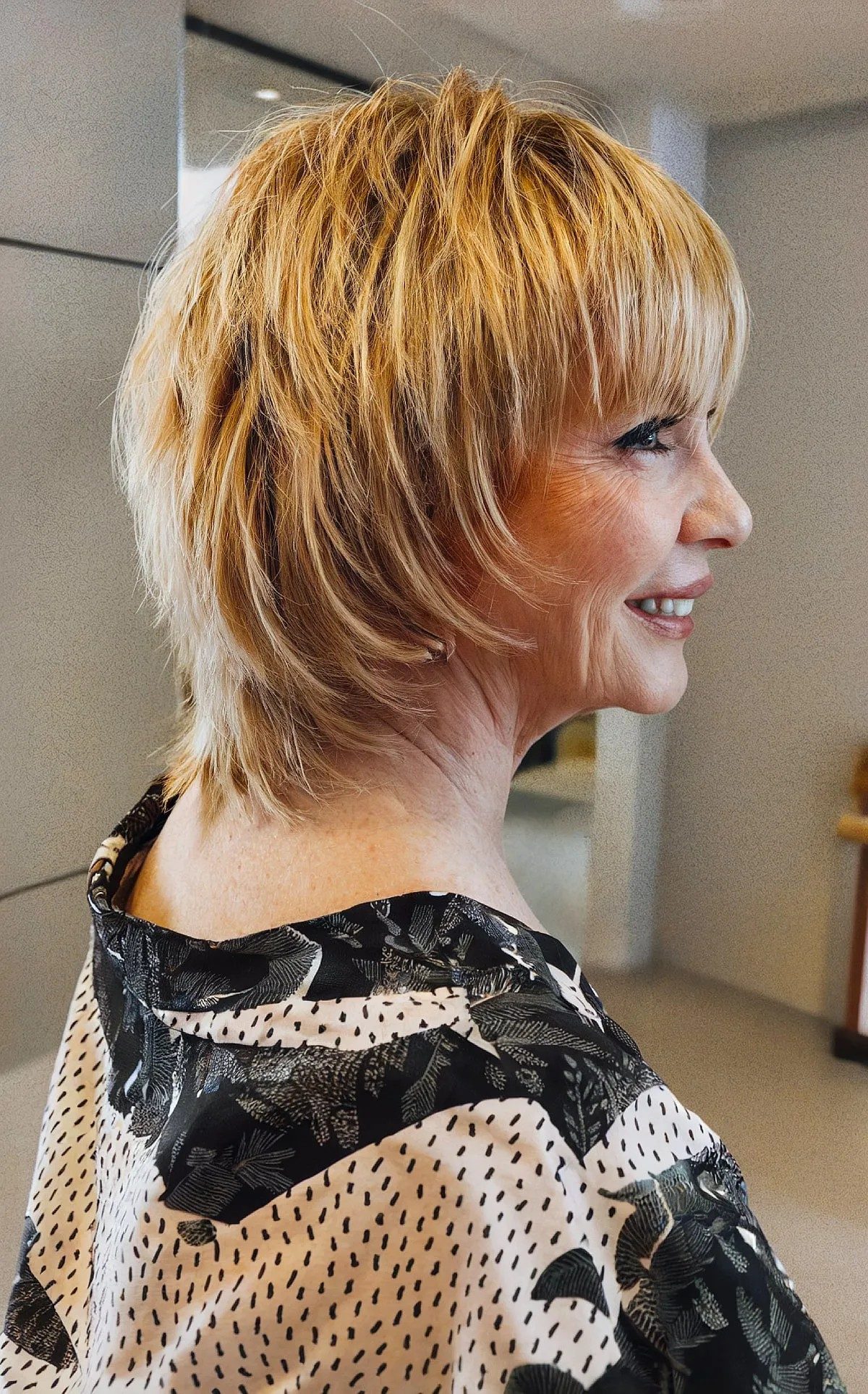 Golden Blonde Collarbone Shag With Blunt Bangs Golden Blonde Collarbone Shag With Blunt Bangs — Hairstyles for Women Over 70