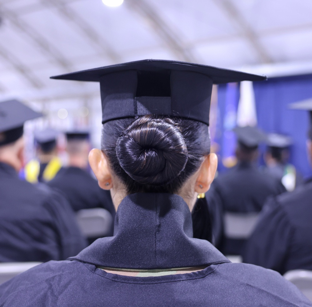 Neat Low Bun Graduation Style Neat Low Bun Graduation Style — Graduation Hairstyles with Cap