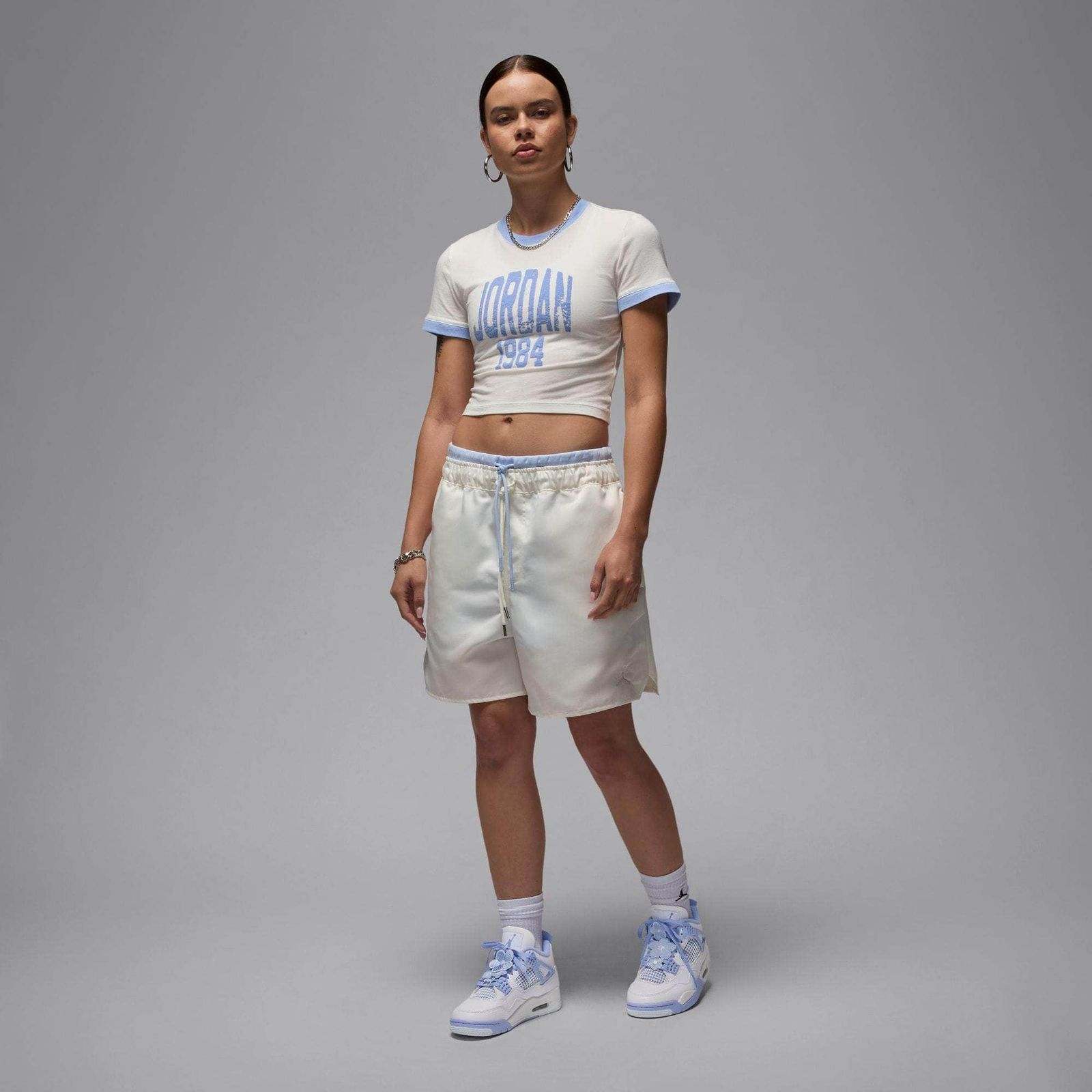 Retro Cool: Jordan 4 'Forget Me Not' with Cropped Tee and Satin Shorts Retro Cool: Jordan 4 'Forget Me Not' with Cropped Tee and Satin Shorts — Jordan 4 Outfits